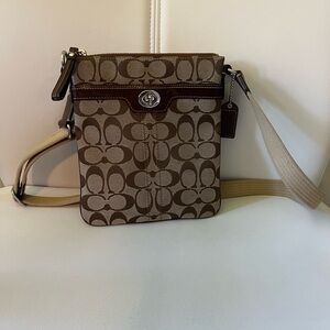 Coach brown signature crossbody bag adjustable fabric strap leather detailing
